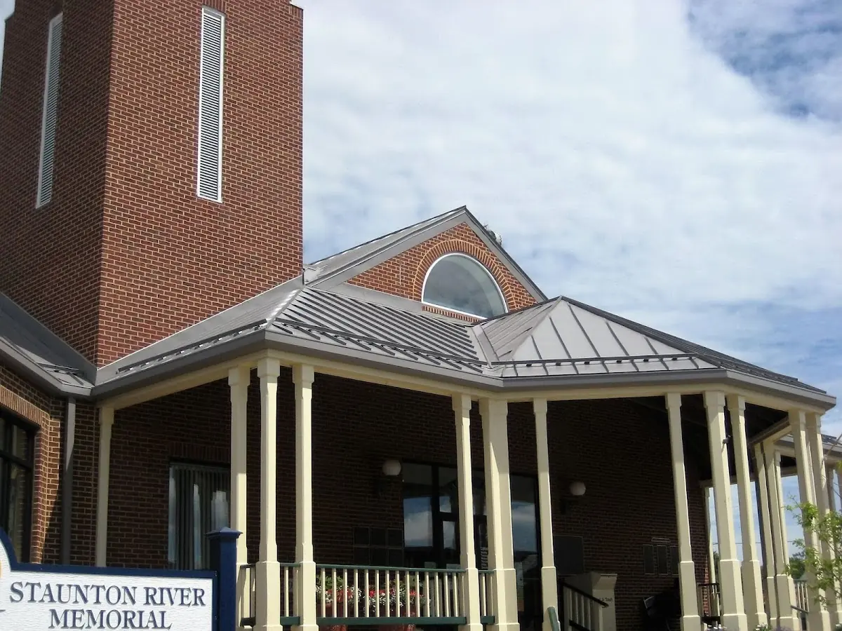 Skilled roofing craftsmen working on a residential roof in Dayton